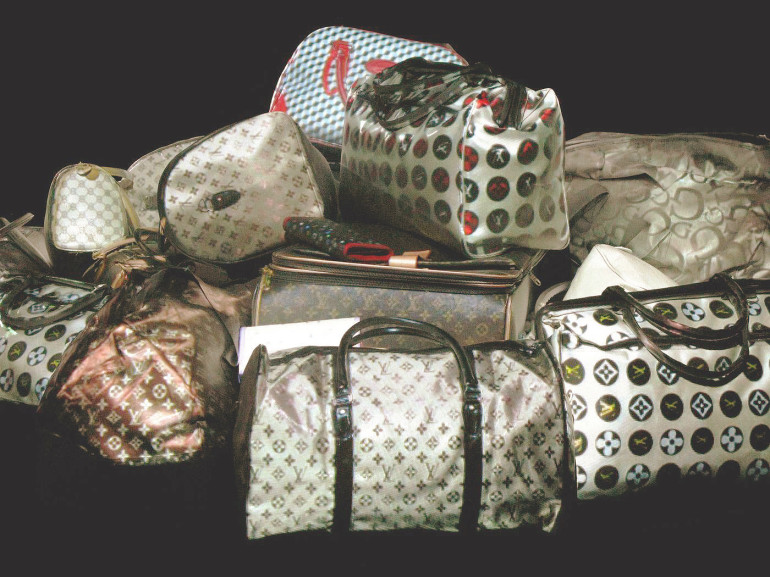 Louis Vuitton Bags, painted in white with video projection